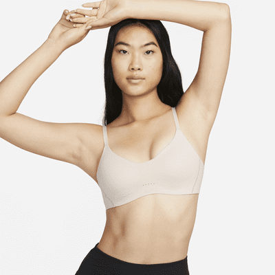 Nike beige sports bra hotsell